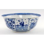 A CHINESE BLUE AND WHITE BOWL, QING DYNASTY with everted rim, the interior painted with a