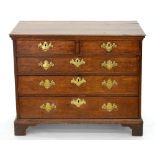 A VICTORIAN OAK CHEST OF DRAWERS WITH BOARDED TOP ON BRACKET FEET, 77CM H; 96 X 52CM