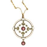 AN ART NOUVEAU RHODOLITE GARNET AND SEED PEARL PENDANT, IN GOLD MARKED 9CT, ON LATER CHAIN,