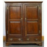 A GEORGE III OAK PRESS WITH PANELLED DOORS, THE BASE FITTED WITH TWO DRAWERS, 146CM H; 132 X 55CM