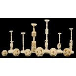 SIX CHINESE IVORY PUZZLE BALL CARVINGS AND STANDS, LARGEST BALL APPROXIMATELY 5.5CM D, 19TH C