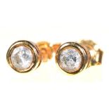 A PAIR OF DIAMOND SOLITAIRE EAR STUDS, DIAMONDS 0.25CT APPROX TOTAL, SET IN GOLD++LIGHT WEAR