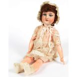 AN ARMAND MARSEILLE BISQUE HEADED DOLL WITH GLASS EYES AND PAINTED PLASTER BODY, EARLY 20TH C