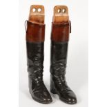 A PAIR OF LEATHER RIDING BOOTS, WITH LASTS, 49CM H