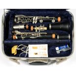 A BOOSEY AND HAWKES CLARINET, CASED