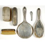 A FIVE PIECE GEORGE V SILVER DRESSING SET, BIRMINGHAM 1912, 1919 AND 1924++TARNISHED.