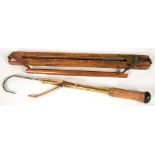 ANGLING. A CORK HANDLED BRASS TELESCOPIC FISHERMAN'S GAFF AND A MAHOGANY GAME SLIDE BY JAMES DIXON