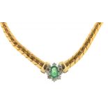 AN EMERALD AND DIAMOND ARTICULATED NECKLACE, OVAL EMERALD 0.6 CT APPROX, IN GOLD MARKED 585, 42 CM