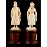 A PAIR OF CONTINENTAL MINIATURE IVORY STATUETTES OF A MAN AND WOMAN, PROBABLY DIEPPE, ON TURNED