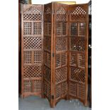 A SOUTH EAST ASIAN HARDWOOD FOUR FOLD SCREEN, 183CM H X 160CM