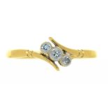 A DIAMOND TWIST RING, IN GOLD MARKED 18CT AND PLAT, 2G, SIZE M++GENERAL WEAR CONSISTENT WITH AGE