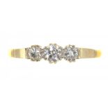 A THREE STONE DIAMOND RING, IN GOLD MARKED 18CT AND PLAT, SIZE P, 2.5G++LIGHT WEAR CONSISTENT WITH