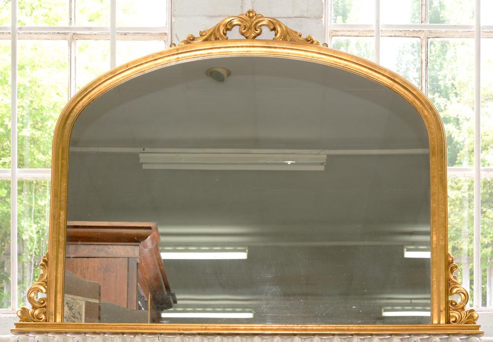 A VICTORIAN STYLE GILTWOOD AND COMPOSITION OVERMANTLE MIRROR, 105 X 139CM