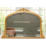 A VICTORIAN STYLE GILTWOOD AND COMPOSITION OVERMANTLE MIRROR, 105 X 139CM