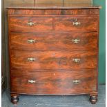 A VICTORIAN MAHOGANY BOW FRONTED CHEST OF DRAWERS ON TURNED FEET, 120CM H; 109 X 58CM