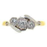 A THREE STONE DIAMOND RING, THE SINGLE CUT DIAMONDS IN GOLD MARKED 18CT & PLAT, SIZE P, 2.5G++