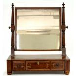 A REGENCY INLAID MAHOGANY DRESSING MIRROR ON BUN FEET, 51CM W