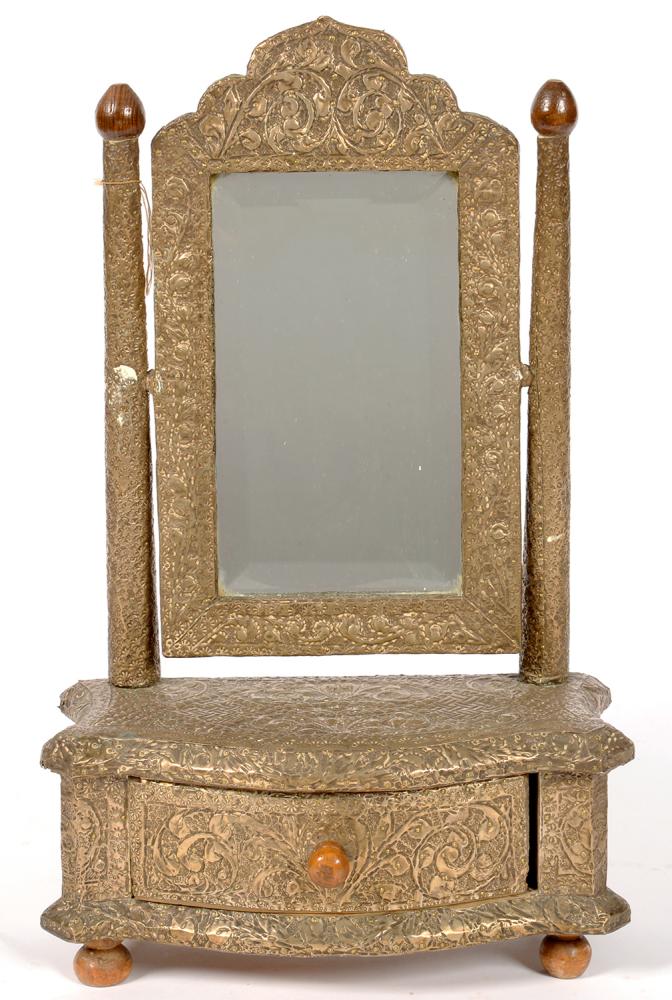 A SHEET SILVER COLOURED METAL COVERED WOOD DRESSING MIRROR, THE SERPENTINE BASE FITTED WITH A