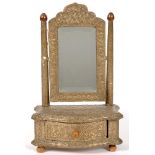 A SHEET SILVER COLOURED METAL COVERED WOOD DRESSING MIRROR, THE SERPENTINE BASE FITTED WITH A