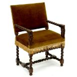 A SPANISH CARVED AND TURNED ELBOW CHAIR