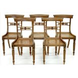 A SET OF FIVE VICTORIAN CARVED MAHOGANY DINING CHAIRS