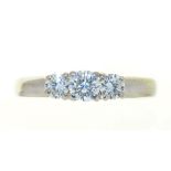 A THREE STONE DIAMOND RING, THE BRILLIANT CUT DIAMONDS 0.55CT, H COLOUR, VS1 CLARITY APPROX, IN