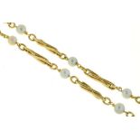 A GOLD NECKLACE WITH CULTURED PEARLS AT INTERVALS, MARKED 9CT, 24.5G++IN GOOD CONDITION