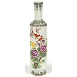 A CHINESE PORCELAIN CYLINDRICAL VASE DECORATED WITH BIRDS IN THE BRANCHES OF A FLOWERING TREE, THE