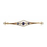 AN EDWARDIAN SAPPHIRE AND OLD CUT DIAMOND BAR BROOCH, millegrain set in gold, 5.2 cm long, 3.5g++