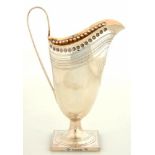 A VICTORIAN HELMET SHAPED SILVER CREAM JUG, 14 CM H, SHEFFIELD 1880, 3OZS++BUILD UP OF DIRT AND