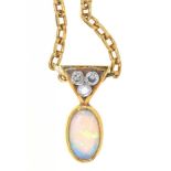AN OPAL AND DIAMOND PENDANT, THE CABOCHON OPAL APPROXIMATELY 1.3CT, IN GOLD, ON GOLD CHAIN, 10.5G++