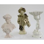 AN ITALIAN GLAZED EARTHENWARE CUPID-AND-SHELL STAND, 52CM H AND TWO DECORATIVE COMPOSITION BUSTS
