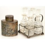 AN EDWARD VII SILVER CRUET WITH FOUR GLASS CONDIMENTS AND STOPPERS, BIRMINGHAM 1909 AND A