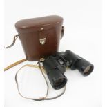 A PAIR OF CARL ZEISS JENOPTEM 10X50 BINOCULARS, CASED