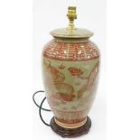 A CHINESE STYLE EARTHENWARE TABLE LAMP, 36CM H AND TWO HUNTING PRINTS