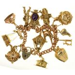 A 9CT GOLD CHARM BRACELET WITH A COLLECTION OF CHARMS, ELEVEN IN 9CT GOLD, ONE IN GOLD MARKED 585,