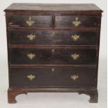 A GEORGE III OAK CHEST OF DRAWERS ON BRACKET FEET, 100CM H; 94 X 54CM