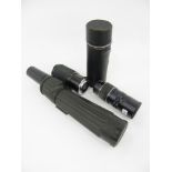A TASCO 3700 18-36X50MM SPOTTING SCOPE AND TWO CAMERA LENSES