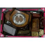 A LEATHER COLLAR BOX, A 1930'S WALNUT MANTEL CLOCK, BINOCULARS AND TINS, ETC