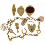 MISCELLANEOUS GOLD JEWELLERY INCLUDING A 9CT GOLD CHARM BRACELET, A CORNELIAN RING IN 9CT GOLD, SIZE