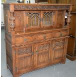 A CARVED OAK COURT CUPBOARD, 137CM H; 137 X 46CM