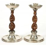 A PAIR OF GEORGE V SILVER AND SPIRAL TURNING OAK CANDLESTICKS, 16 CM H, LOADED, CHESTER 1922++