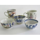 A CHINESE IMARI COFFEE CUP, A FAMILLE ROSE COFFEE CUP AND THREE BLUE AND WHITE TEA BOWLS, ONE WITH