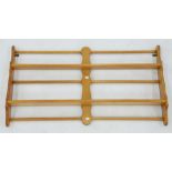 AN ASH PLATE RACK, 57 X 104CM