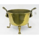 A BRASS COAL BUCKET WITH LION MASK HANDLES AND PAW FEET, 28CM H, 35CM D