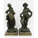 A PAIR OF BRONZED FIGURES OF A YOUTH AND GIRL, IN FRENCH 19TH C STYLE, ON EBONISED AND WALNUT