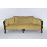 A NORTH EUROPEAN CARVED WALNUT SOFA, COVERED IN GOLD FABRIC, EARLY 19TH C, 218CM W