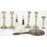 A SET OF FOUR GEORGE V SILVER CANDLESTICKS, 16 CM H, LOADED, BIRMINGHAM 1920, A GEORGE V SILVER HAND