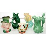 A BESWICK MICAWBER CHARACTER JUG AND FOUR VARIOUS SYLVAC AND OTHER DECORATIVE JUGS