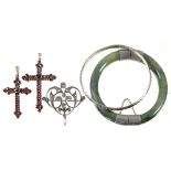 A NEPHRITE BANGLE, A SILVER BANGLE, AN ART NOUVEAU PASTE BROOCH IN SILVER AND TWO BOHEMIAN GARNET